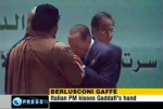 baciamano-di-berlusconi-a-gheddafi.jpg